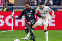 1761477911522-kevin-diks-michael-olise-borussia-moenchengladbach-vs-bayern-munich-bundesliga-liga-jerman-1761432380623_169