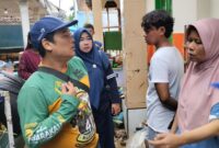 1762622574057-dinas-pengendalian-penduduk-dan-keluarga-berencana-dppkb-kabupaten-sukabumi-menyalurkan-bantuan-langsung-kepada-petugas-lapang-1762576117761_169