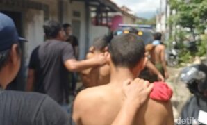 1764327960982-polisi-saat-menggerebek-kamar-penginapan-yang-diduga-jadi-lokasi-penyekapan-1764214685723_169