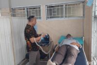 1765451115014-warga-melakukan-usg-cek-kondisi-kesehatan-1765419721091_169