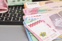 1766639105517-ilustrasi-uang_169