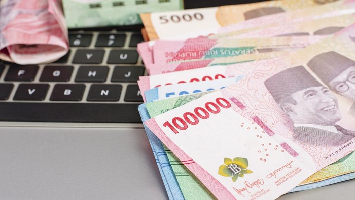 1766747102460-ilustrasi-uang_169