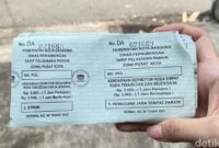 1767503160730-karcis-parkir-resmi-untuk-zona-pusat-kota-1767079149070_169