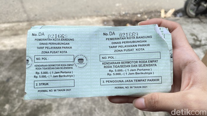 1767503160730-karcis-parkir-resmi-untuk-zona-pusat-kota-1767079149070_169